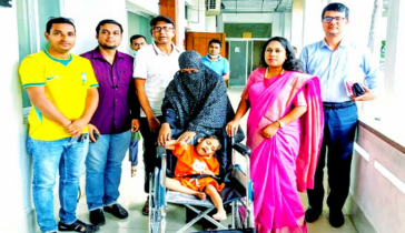 শেরপুরে হুইল চেয়ার পেল প্রতিবন্ধী শিশু মানসুরা